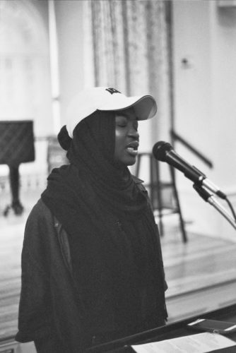Kadidja Cisse performing a poem.